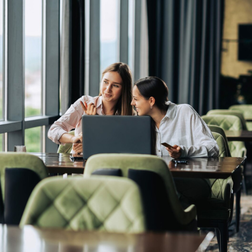 two practitioners on laptop